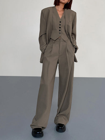 Bundfaltenhose mit elastischem Bund und seitlichen Taschen