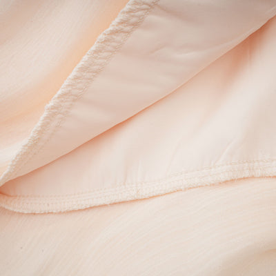 Weißes Maxikleid mit Schleife – Eleganz für besondere Anlässe